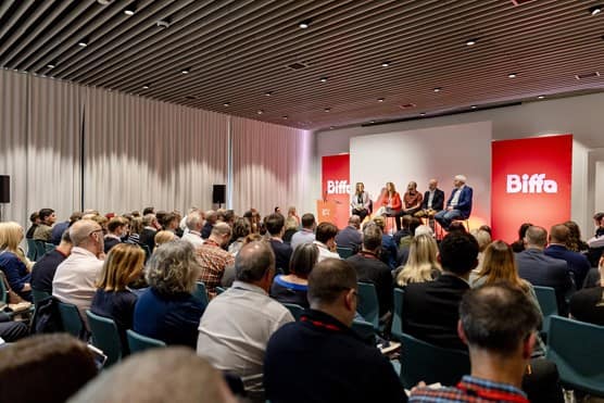 WNZ presenters discussing on stage