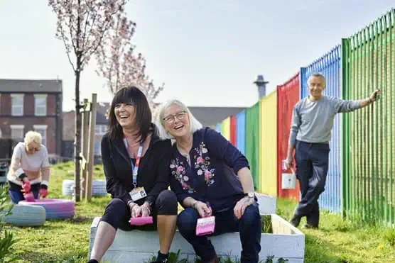 Public laughing in garden