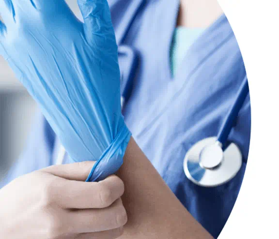 Doctor putting on gloves