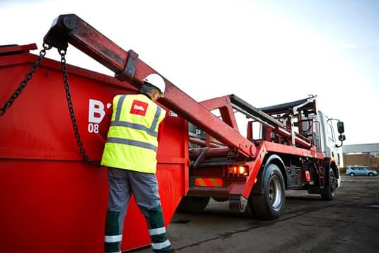 Biffa skip being offloaded from vehicle