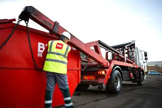 Biffa skip being offloaded from vehicle