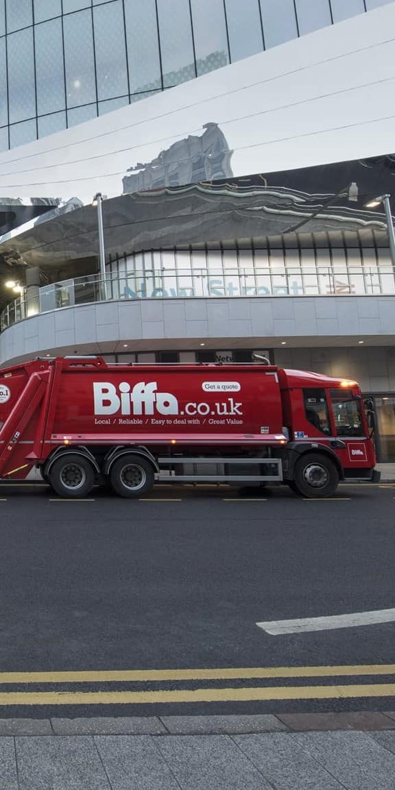 Biffa truck outside train station