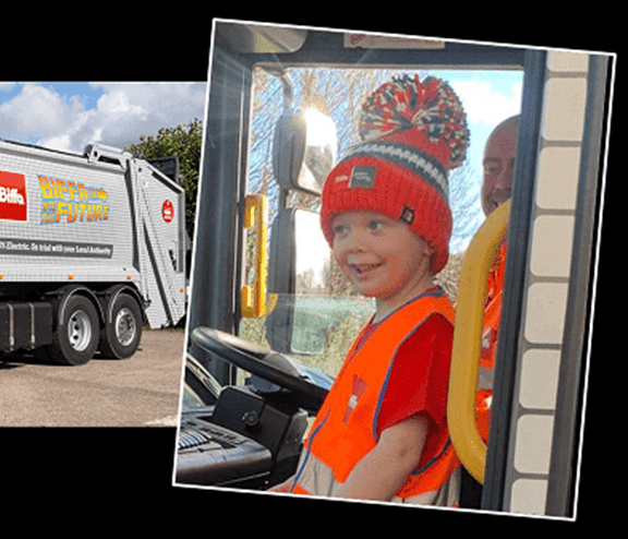 Boy in Biffa truck