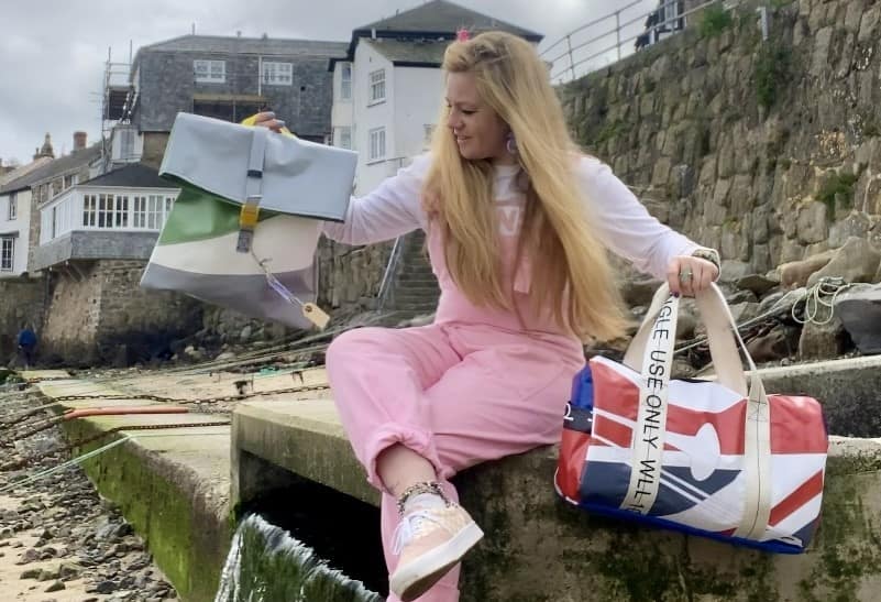 Kate Doran holding bags