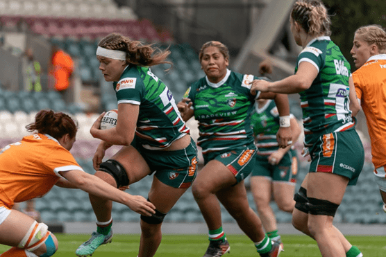 Leicester tigers players playing a match with Biffa logo on the back after renewing partnership with them