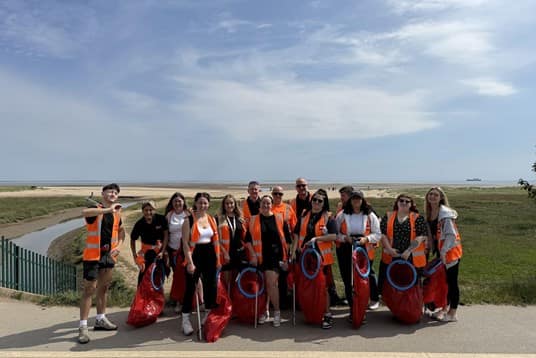 Biffa's Humberside commercial team with telesales department cleaning Humberston Fitties Beach