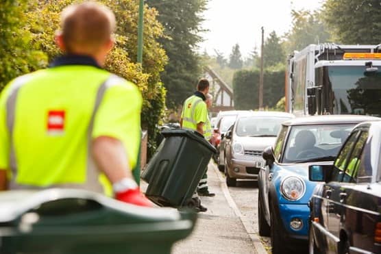 Photo of street with biffa staff collecting bins