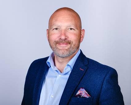 Headshot of Marc Angell