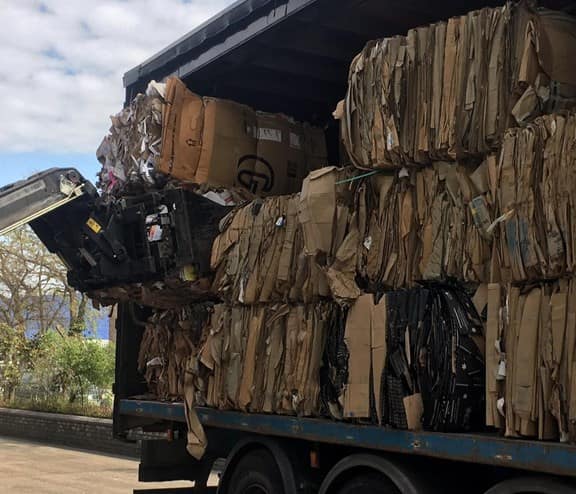 baled cardboard in truck