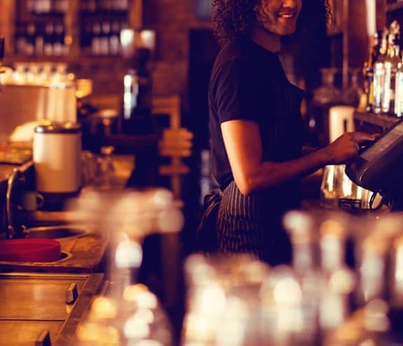 Employee behind the bar