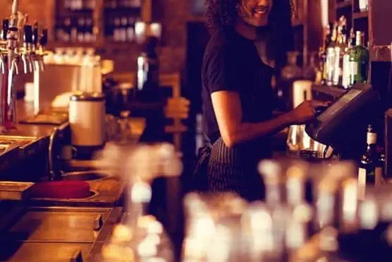 Employee behind the bar