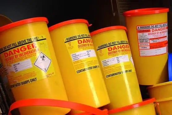 Clinical sharps bins