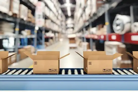 Boxes on conveyor belt in warehouse